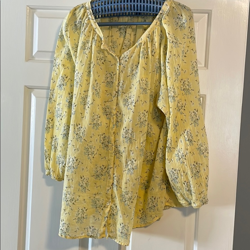 Yellow blouse with light blue flowers